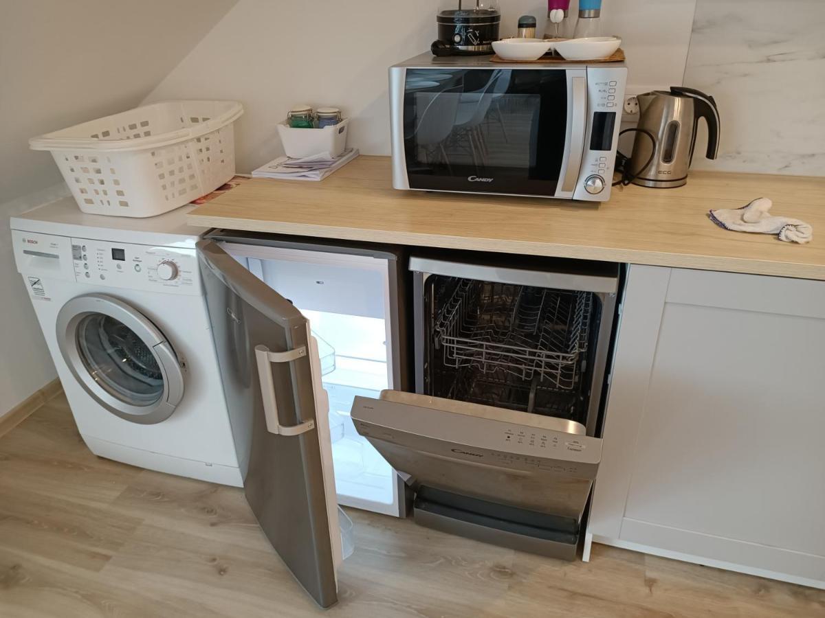 Liuto Apartamentai Juodkrante Bagian luar foto